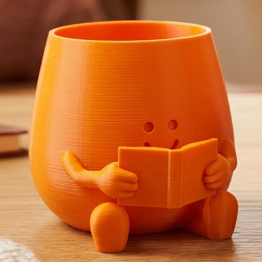 HAPPY FACE READING BOOK PLANTER POT