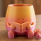 HAPPY FACE READING BOOK PLANTER POT