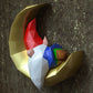 Gnome sleeping on moon