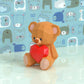 Teddy Bear holding heart